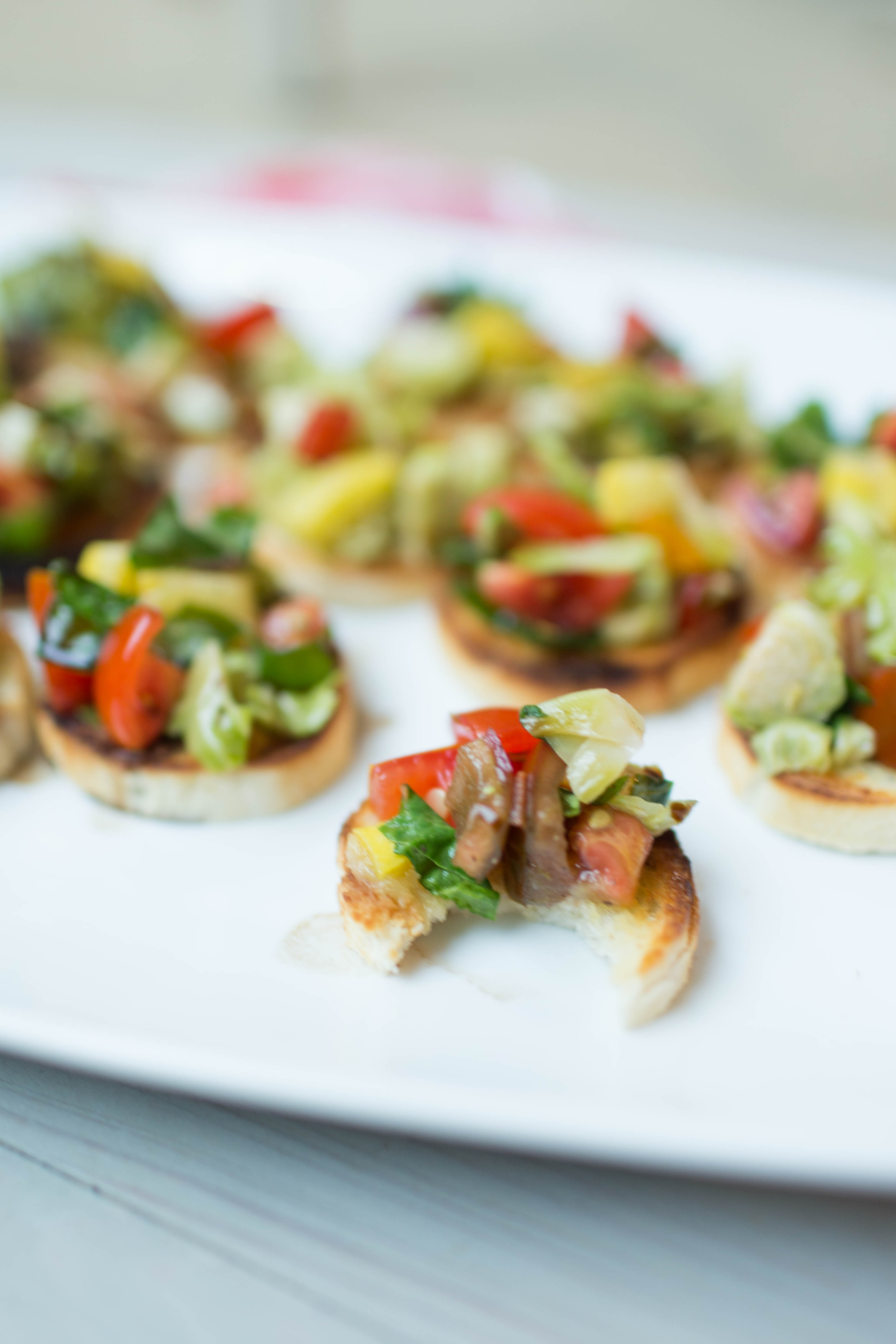 Summertime Veggie Bruschetta | The perfect appetizer for your next summer dinner party! | read more at happilythehicks.com