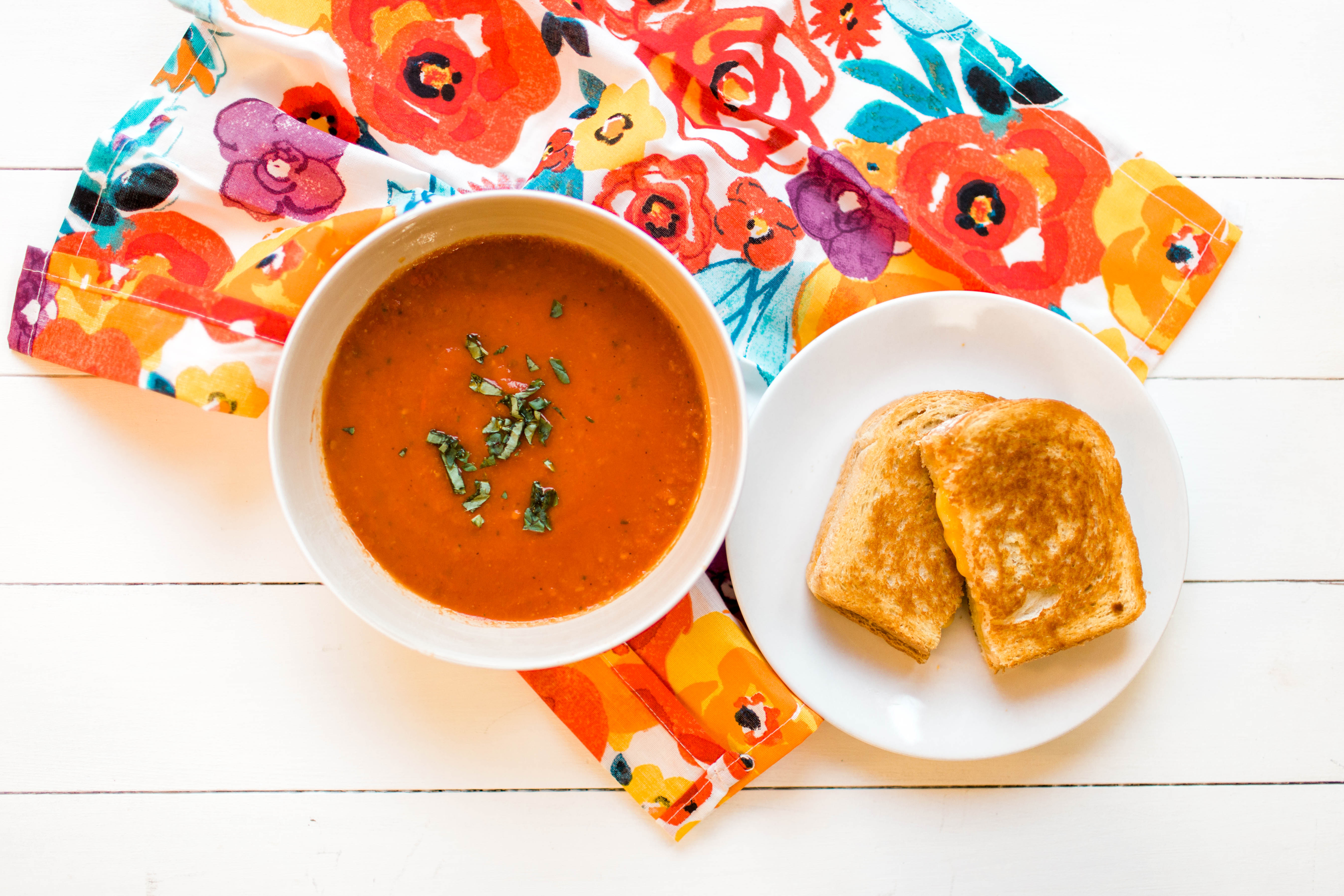 Yummy homemade tomato soup- perfect for a cold winter's night! | read more at happilythehicks.com